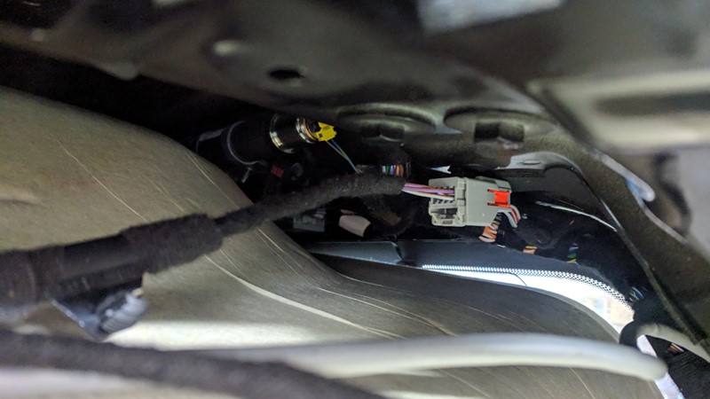 New reverse camera tailgate harness connected to the existing power and data connector
