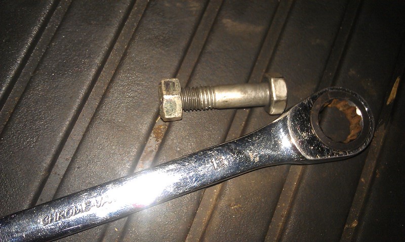 Pinch bolt removed using multiple 13mm spanners