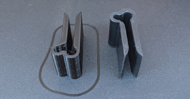 The newly printed part (left) alongside the original (right)