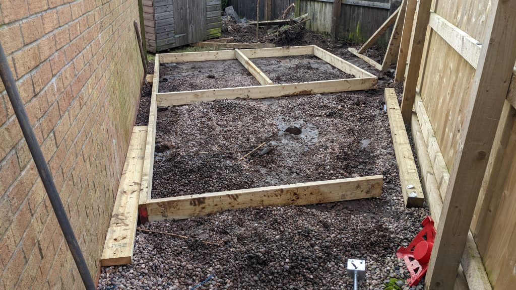 Groundwork complete and frame built, holes are dug ready for the piers.