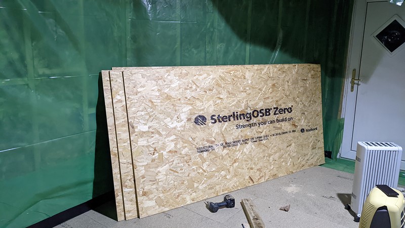 OSB panels are installed over the vapour barrier.