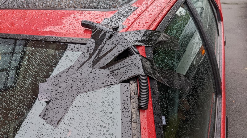 Plenty of sealant should stop the windscreen from leaking again!