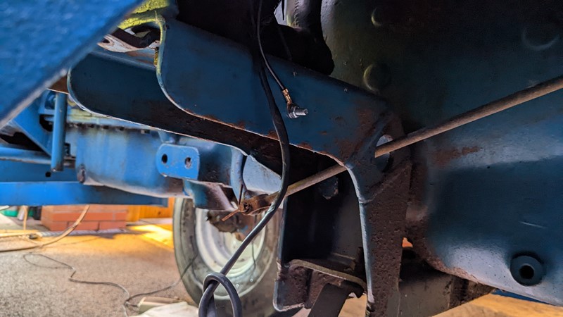 A new ground connection was made at an existing hole in the cab mount.