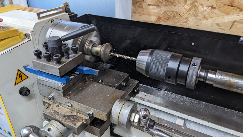 A Mini lathe is employed to get the hole centred.