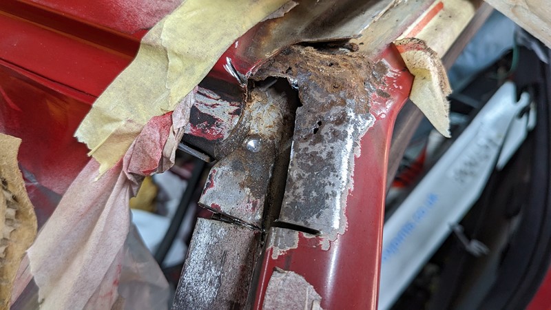 Windscreen surround corrosion doesn't penetrate too far.