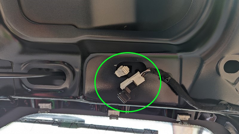 One bolt is hidden behind the camera connector.